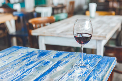 Wineglass on table at restaurant