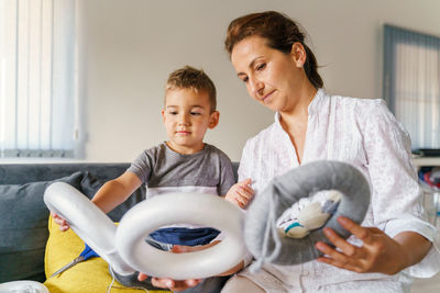 Mother and son playing at home