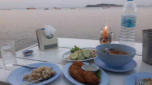 Close-up of food on table at beach