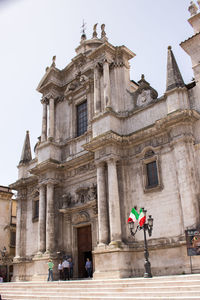 Low angle view of building against sky in sulmona