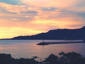 Scenic view of sea at sunset