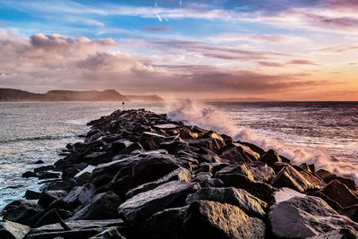 Scenic view of sea against sky during sunset