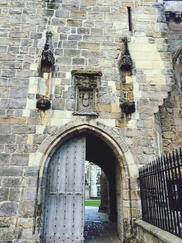 architecture, built structure, building exterior, brick wall, outdoors, day, arch, no people, entrance