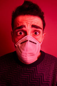 Close-up portrait of a serious young man