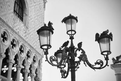 Low angle view of street light against clear sky