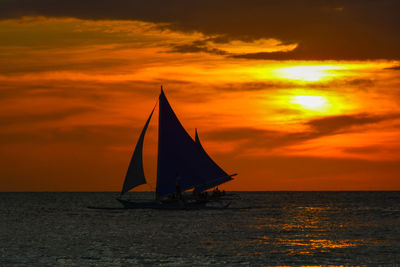 Scenic view of sea at sunset