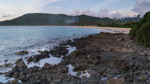 Scenic view of beach against sky