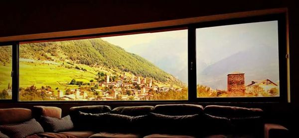 Panoramic shot of vehicle seen through window