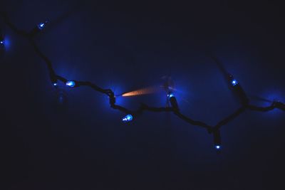 Close-up of illuminated water at night