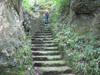 Man walking on staircase