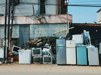 Garbage bin by buildings