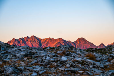 Scenic view of snowcapped mountains against clear sky