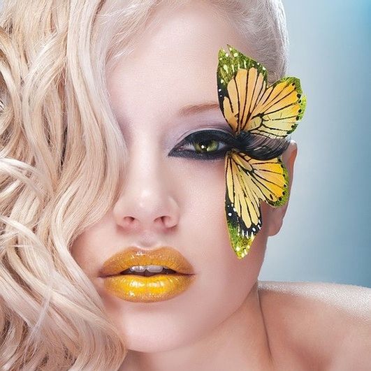 close-up, indoors, yellow, freshness, headshot, studio shot, front view, food and drink, holding, lifestyles, human face, person, fruit, healthy eating, looking at camera, portrait, focus on foreground, food