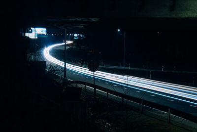 High angle view of light trails on street at night