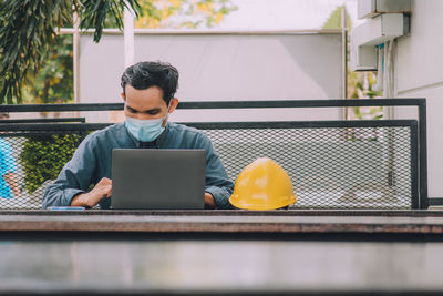 Man working on table