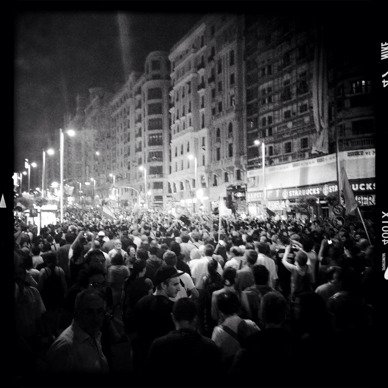 large group of people, crowd, illuminated, night, men, lifestyles, person, transfer print, built structure, architecture, leisure activity, building exterior, music, city life, city, street, togetherness, crowded