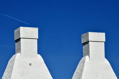 Low angle view of building against blue sky