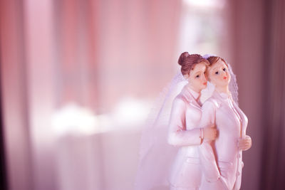 Close-up of woman figurines