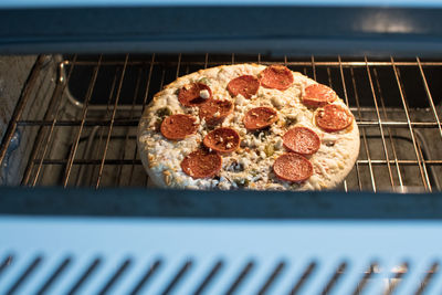 Close-up of pizza in oven