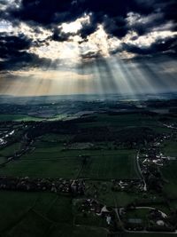 Scenic view of landscape against cloudy sky