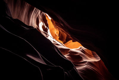 Close-up of abstract pattern against black background