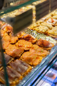 Close-up of meat on barbecue grill