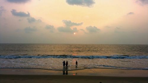 Scenic view of sea at sunset