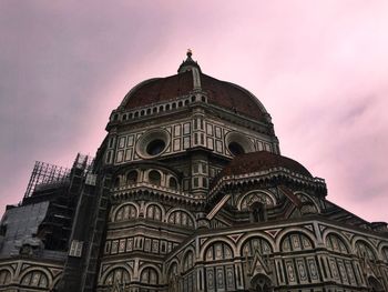 Low angle view of florence cathedral against sky during sunset