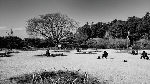 People in park against clear sky