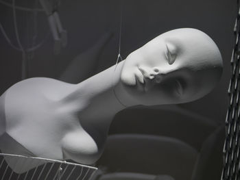 Girl looking away while sitting on seat