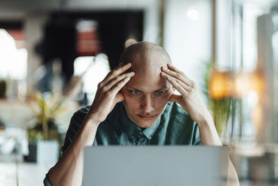 Young woman using laptop