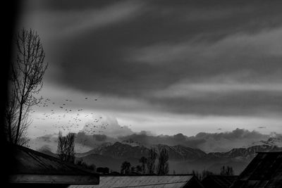 View of landscape against cloudy sky