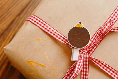 High angle view of paper tied up on box