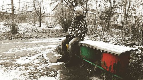 Man on boat against trees