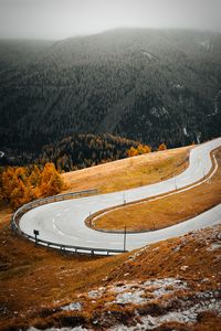 High angle view of winding road on landscape