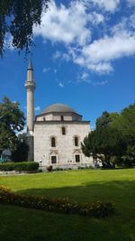 View of historical building in field