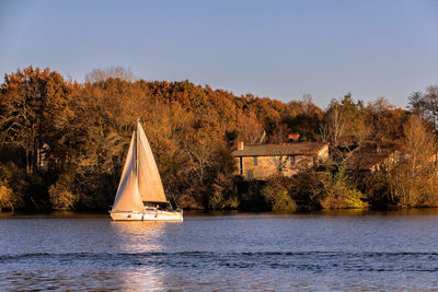 Sailboat against sky during autumn