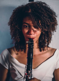 Portrait of young woman looking away