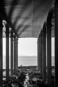 Bridge over sea against sky