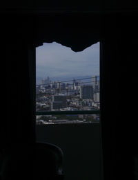 Cityscape seen through window