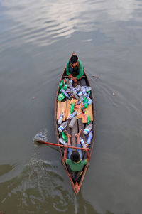 High angle view of man on boat in river