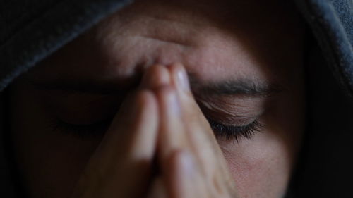 Close-up of woman with eyes closed