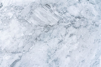 Full frame shot of snow on rock