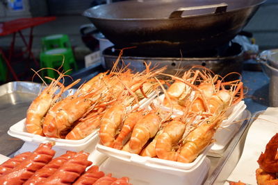 High angle view of meat on barbecue grill