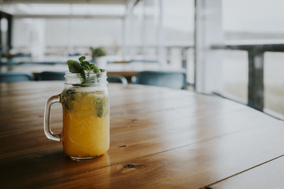 Close-up of drink in mason jar on table