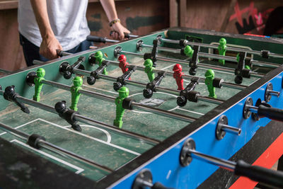 Group of people playing soccer on table