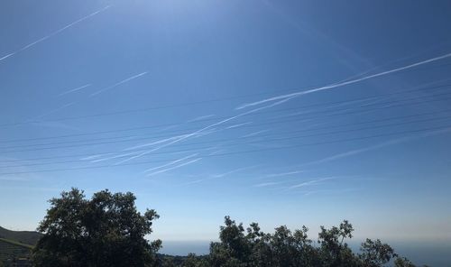 Low angle view of vapor trail in sky