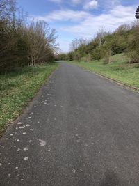 Surface level of empty road along landscape