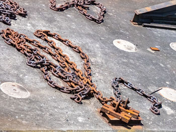 High angle view of rusty chain