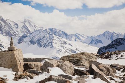 Scenic view of snowcapped mountains against sky